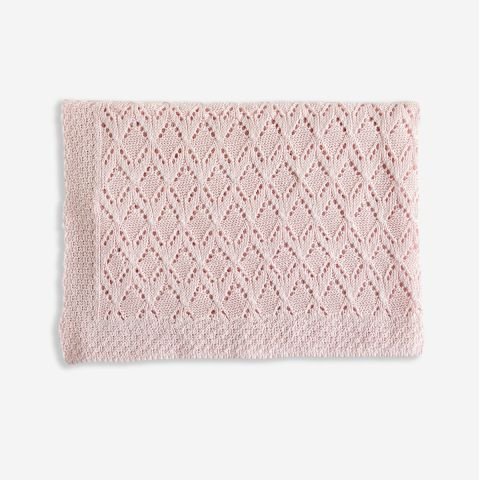 Coperta da lettino in filo di cotone rosa con rombi